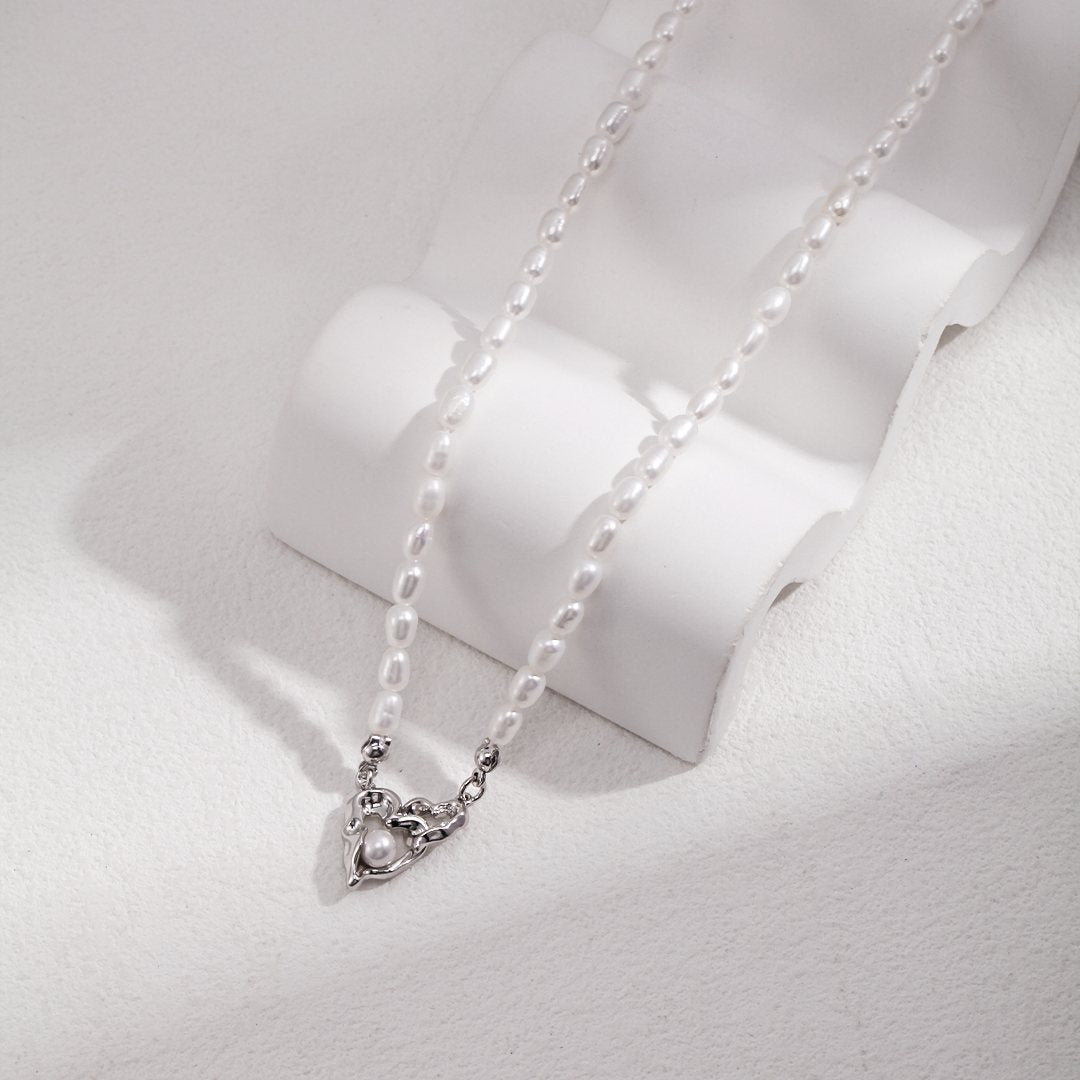 DOUBLE HEART CROSS PEARL NECKLACE