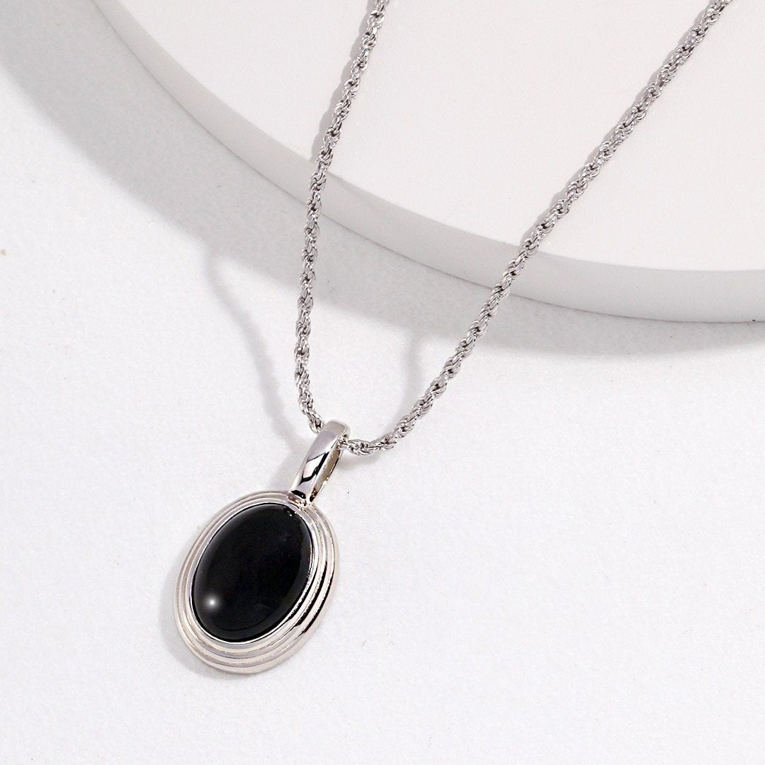 OVAL BLACK ONYX / MOTHRT OF PEARL PENDANT