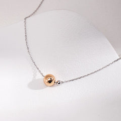 GOLD BALL NECKLACE